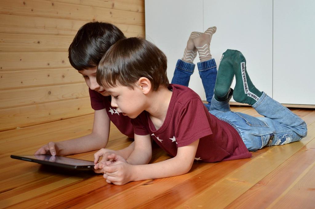 Analyst reviewing data charts on a tablet
